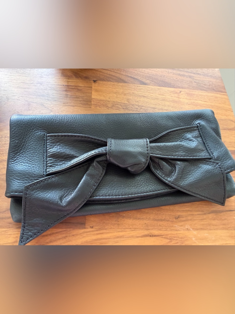Black Leather Bow-Accent Foldover Clutch